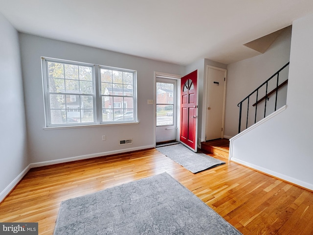 entrance foyer with light hardwood / wood-style floors