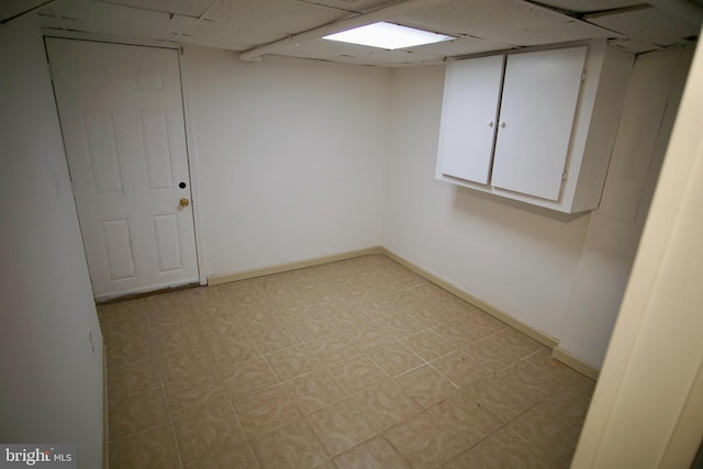 basement with a drop ceiling