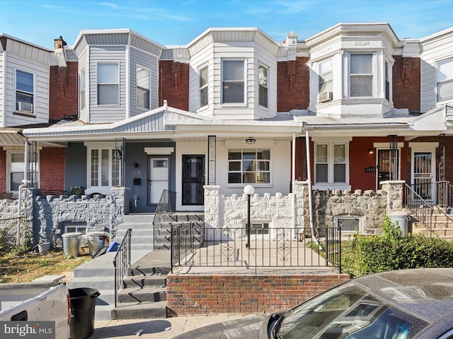 multi unit property featuring covered porch