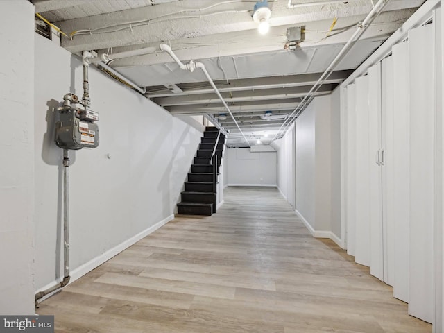 basement featuring light hardwood / wood-style flooring