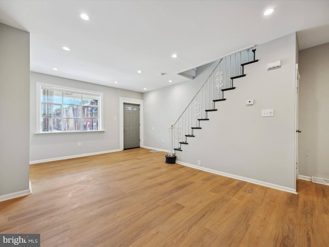 foyer entrance featuring light wood-type flooring