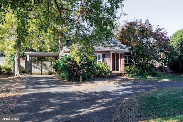 view of front of home featuring a carport