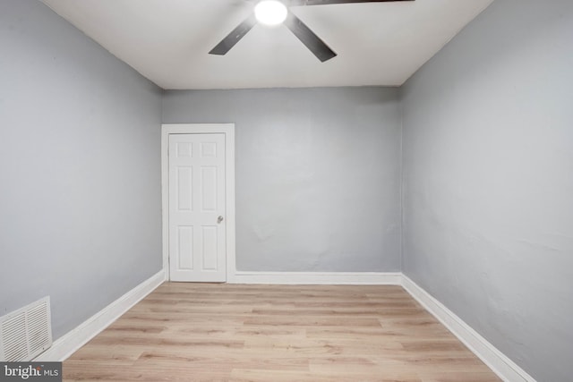 unfurnished room featuring light hardwood / wood-style flooring and ceiling fan