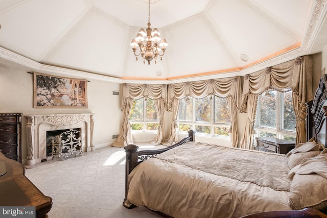 carpeted bedroom with lofted ceiling, a fireplace, and a chandelier