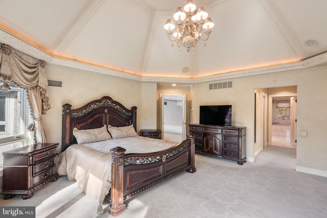 bedroom with light carpet, a chandelier, crown molding, and ensuite bathroom