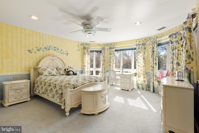 carpeted bedroom featuring ceiling fan