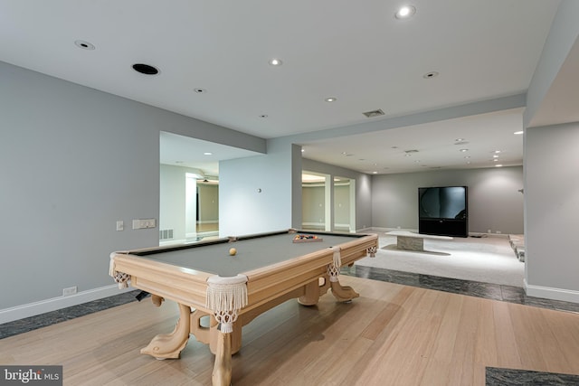 game room with light hardwood / wood-style floors and pool table