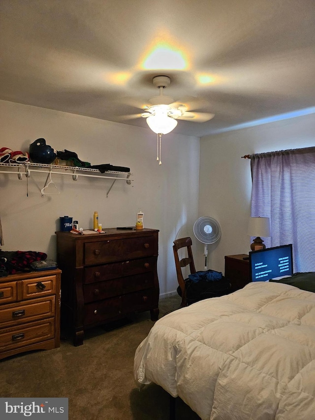 carpeted bedroom with ceiling fan