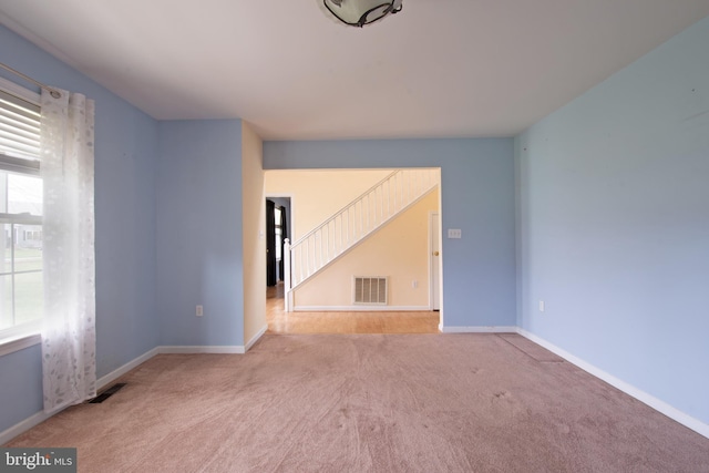 606 Saint Andrews Ct, Dagsboro, DE 19939 - interior space featuring stairway, baseboards, and visible vents
