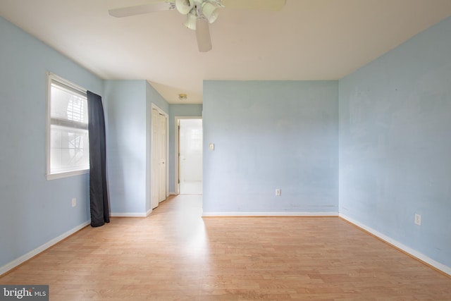 606 Saint Andrews Ct, Dagsboro, DE 19939 - empty room featuring baseboards, light wood-type flooring, and a ceiling fan