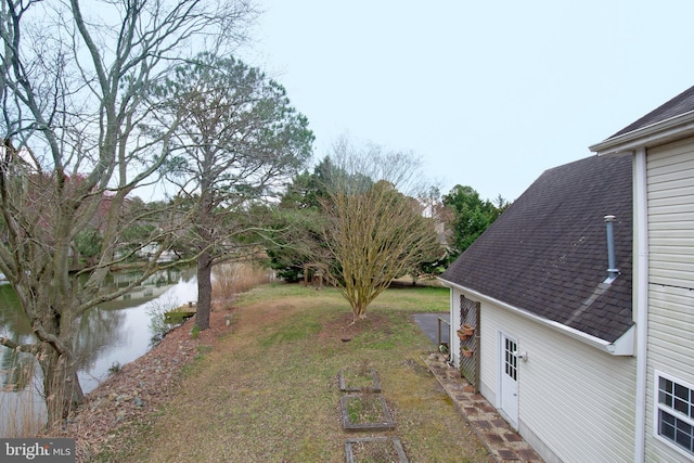 view of yard with a water view