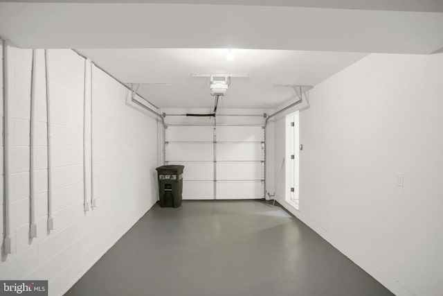 garage featuring a garage door opener