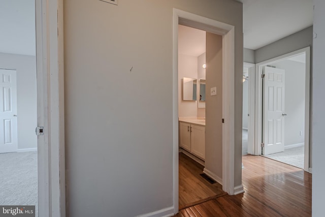 hall featuring light hardwood / wood-style flooring