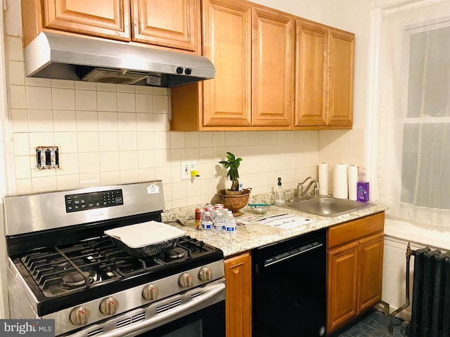 kitchen with radiator, tasteful backsplash, black dishwasher, sink, and gas stove