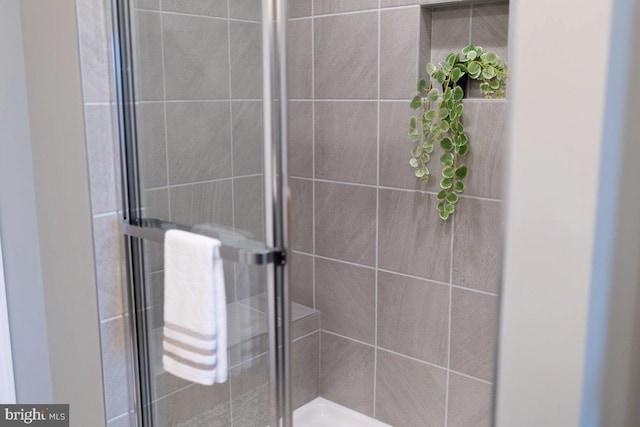 bathroom with a stall shower