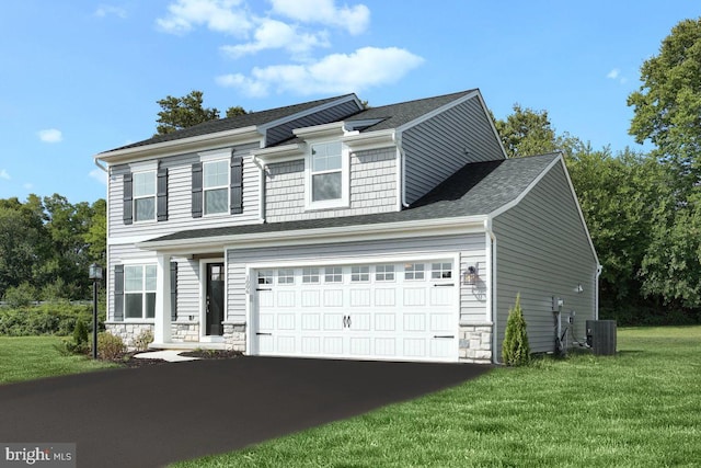 view of front of house featuring central air condition unit, stone siding, a front yard, and aphalt driveway