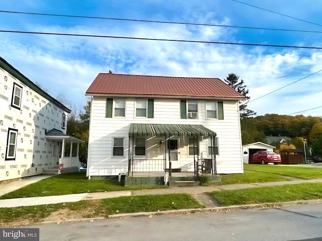 view of front of home with a front lawn