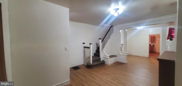 unfurnished living room with light wood-type flooring