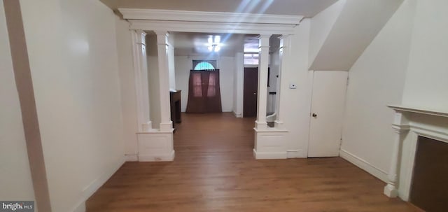 hallway with hardwood / wood-style floors