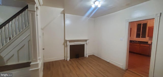 interior space featuring hardwood / wood-style floors and sink