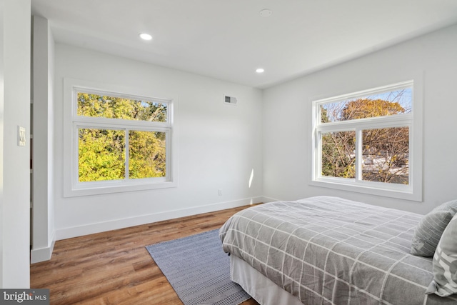 bedroom featuring hardwood / wood-style floors