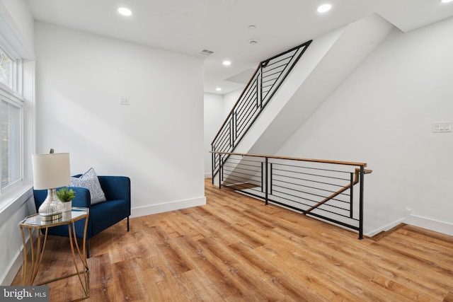 sitting room with light hardwood / wood-style floors