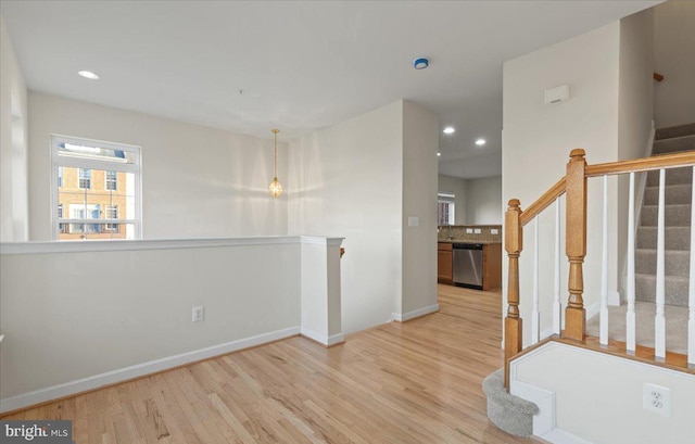 unfurnished room featuring light hardwood / wood-style floors