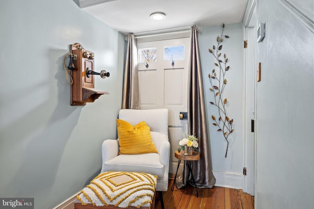 sitting room featuring hardwood / wood-style flooring