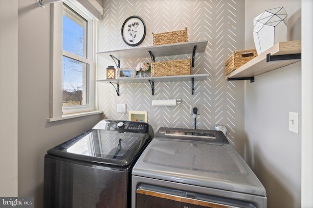 laundry area featuring washing machine and dryer