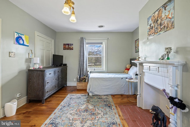 bedroom featuring hardwood / wood-style flooring