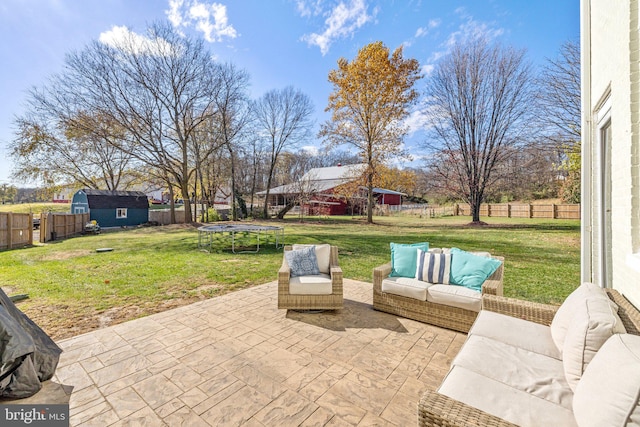 view of patio / terrace featuring an outdoor living space and a trampoline