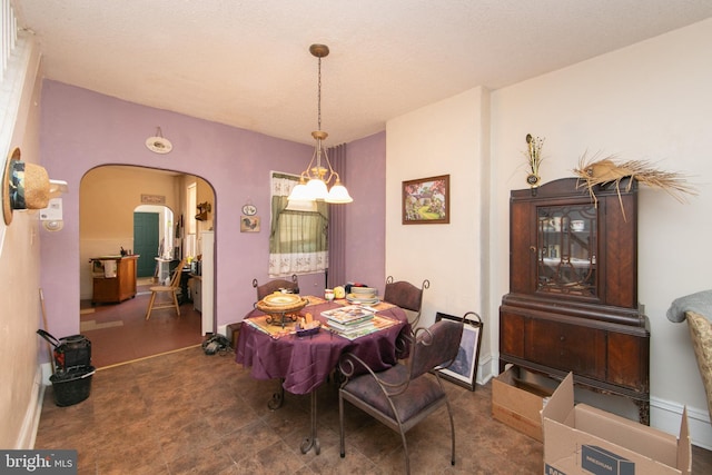 dining room with a chandelier