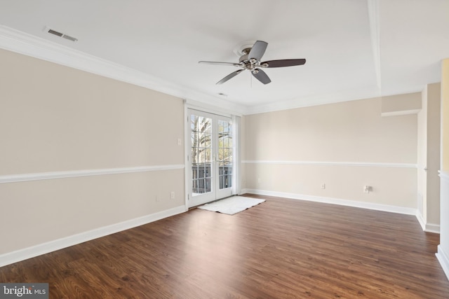 empty room with dark hardwood / wood-style flooring, ceiling fan, french doors, and ornamental molding