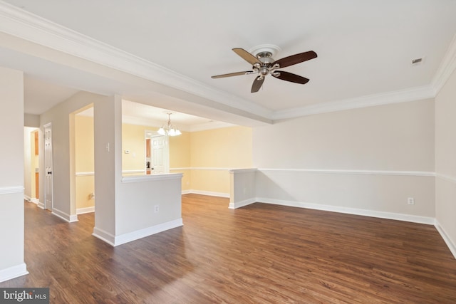 unfurnished room featuring dark wood-type flooring, ceiling fan with notable chandelier, and ornamental molding