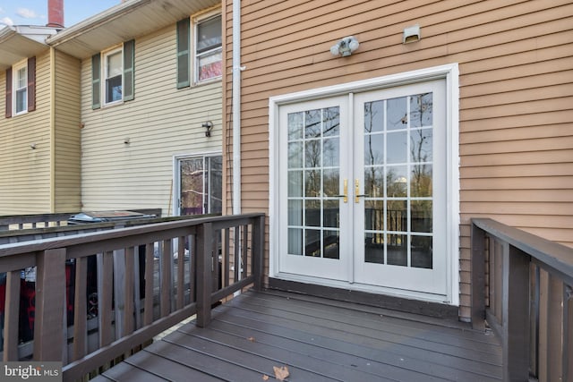 wooden deck featuring french doors