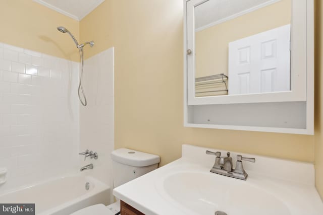 full bathroom featuring ornamental molding, vanity, toilet, and  shower combination