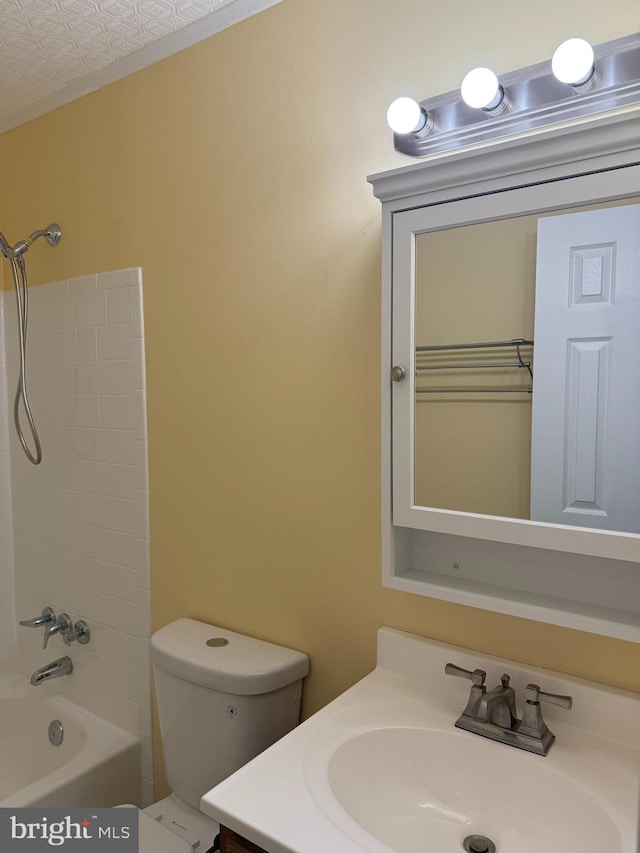 full bathroom with washtub / shower combination, vanity, and toilet