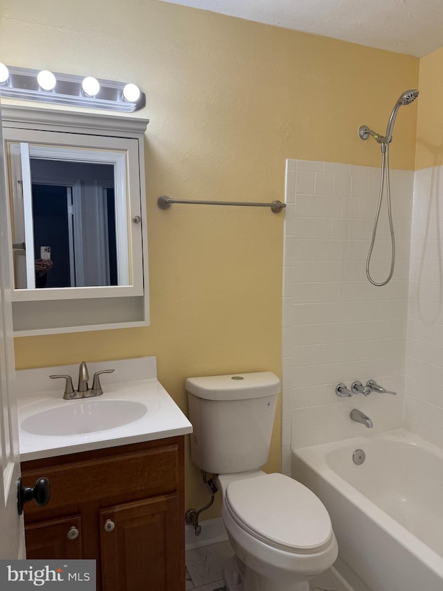 full bathroom with vanity, toilet, and shower / washtub combination