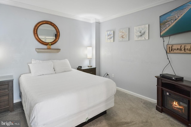 bedroom featuring crown molding and carpet flooring