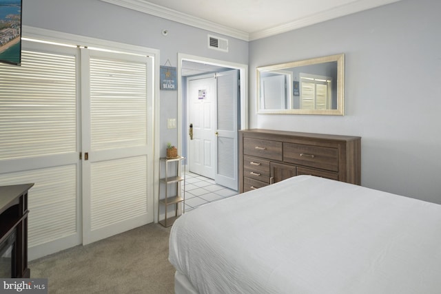 bedroom featuring crown molding and light colored carpet