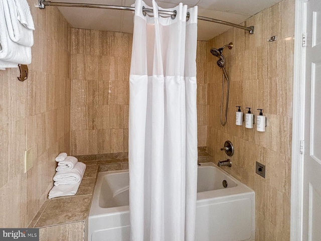 bathroom with shower / bath combo