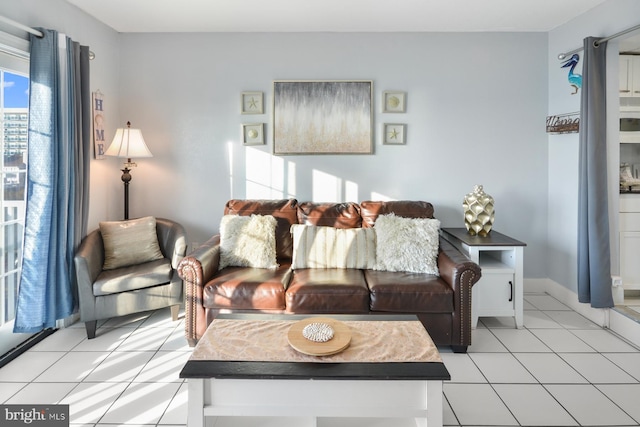 200 59th St Unit 302, Ocean City, MD 21842 - living room featuring light tile patterned flooring