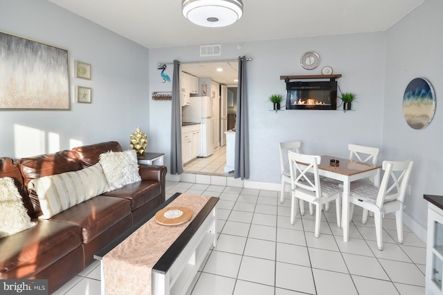 living room featuring light tile patterned floors