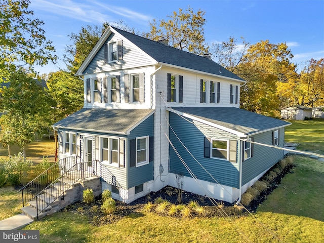 exterior space with a front yard