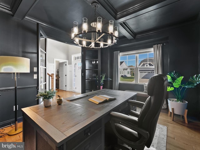 office featuring beam ceiling, light hardwood / wood-style flooring, crown molding, and coffered ceiling