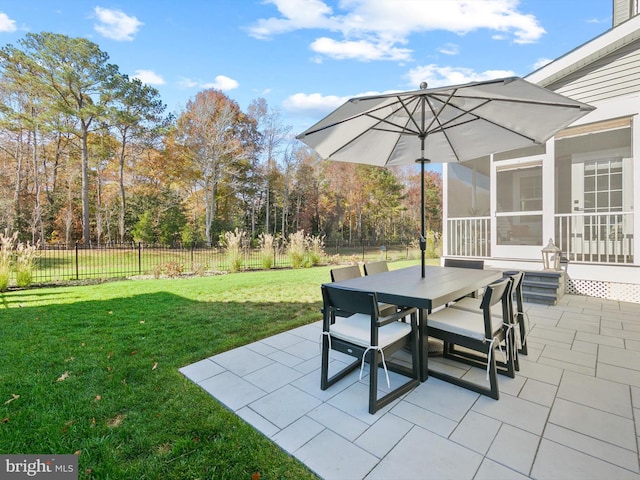 view of patio / terrace with a sunroom