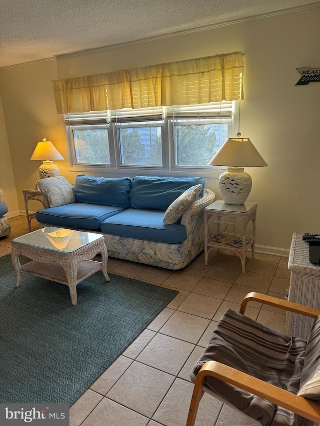 13 75th St Unit 1W, Ocean City, MD 21842 - living room with tile patterned flooring, a textured ceiling, and plenty of natural light