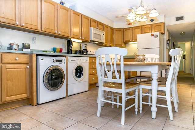 13 75th St Unit 1W, Ocean City, MD 21842 - laundry room featuring light tile patterned floors, laundry area, independent washer and dryer, and visible vents