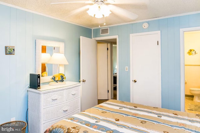 13 75th St Unit 1W, Ocean City, MD 21842 - bedroom with a ceiling fan, a textured ceiling, visible vents, ensuite bath, and ornamental molding