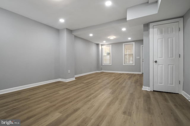 spare room with light hardwood / wood-style flooring